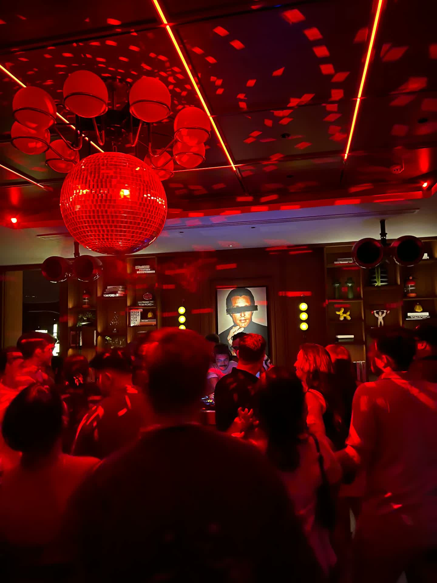 Red-lit dance floor at APT 101