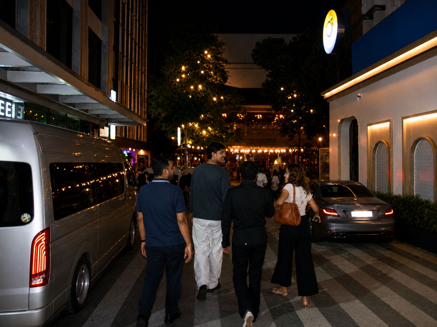 The group walking together to the second venue on Soi 11