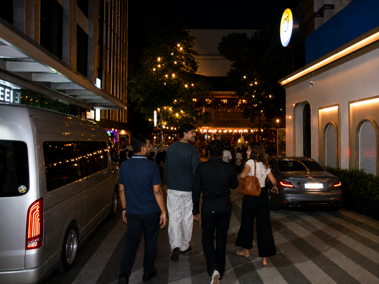 The group walking together to the second venue on Soi 11